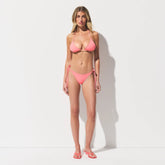 SIGNATURE SWIM DIPPED TIE BIKINI BOTTOM | MELON ON A MODEL FRONT VIEW @ | FOCUS: 0.0, 1.0, 0.9