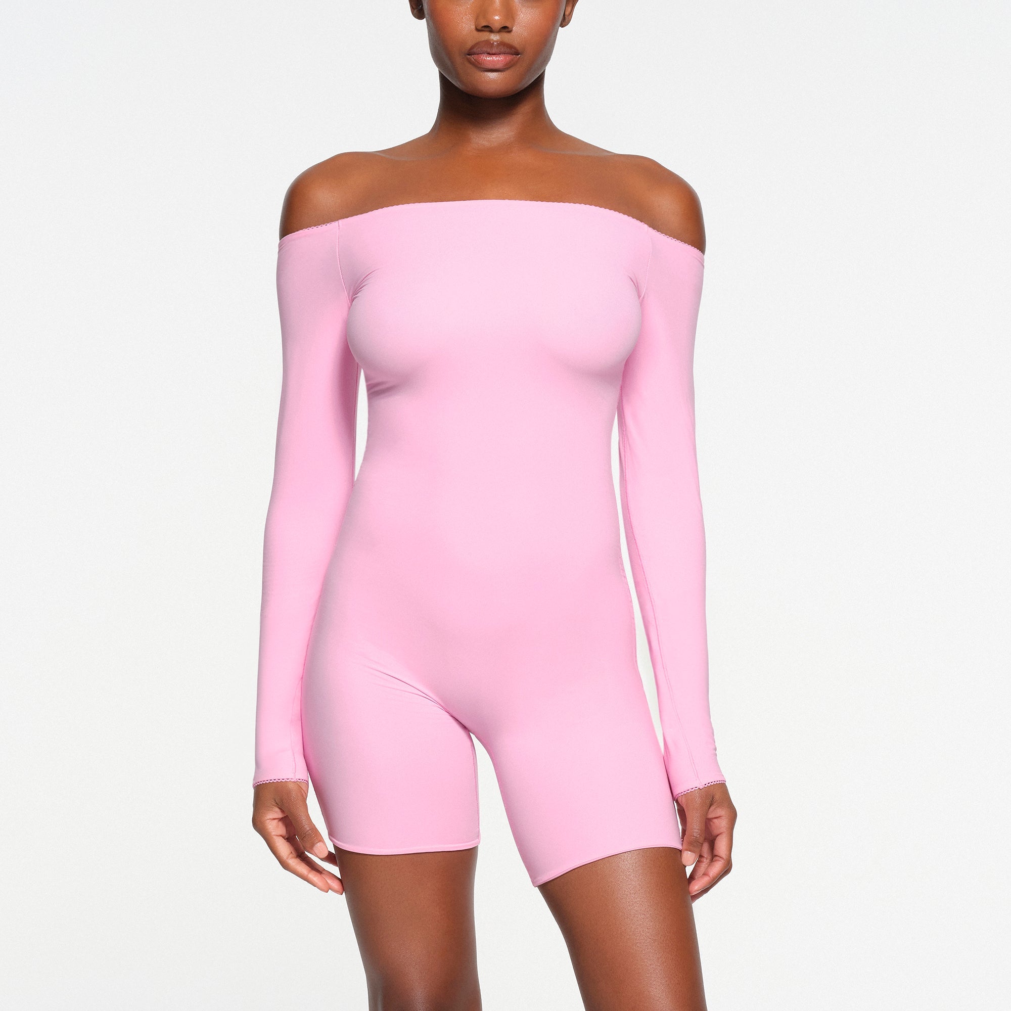 FITS EVERYBODY PICOT TRIM OFF THE SHOULDER ONESIE | BUBBLE GUM ON A MODEL FRONT VIEW