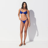 ICONIC SWIM STRING BIKINI BOTTOM | COBALT ON A MODEL FRONT VIEW @ | FOCUS: 0.0, 1.0, 0.9
