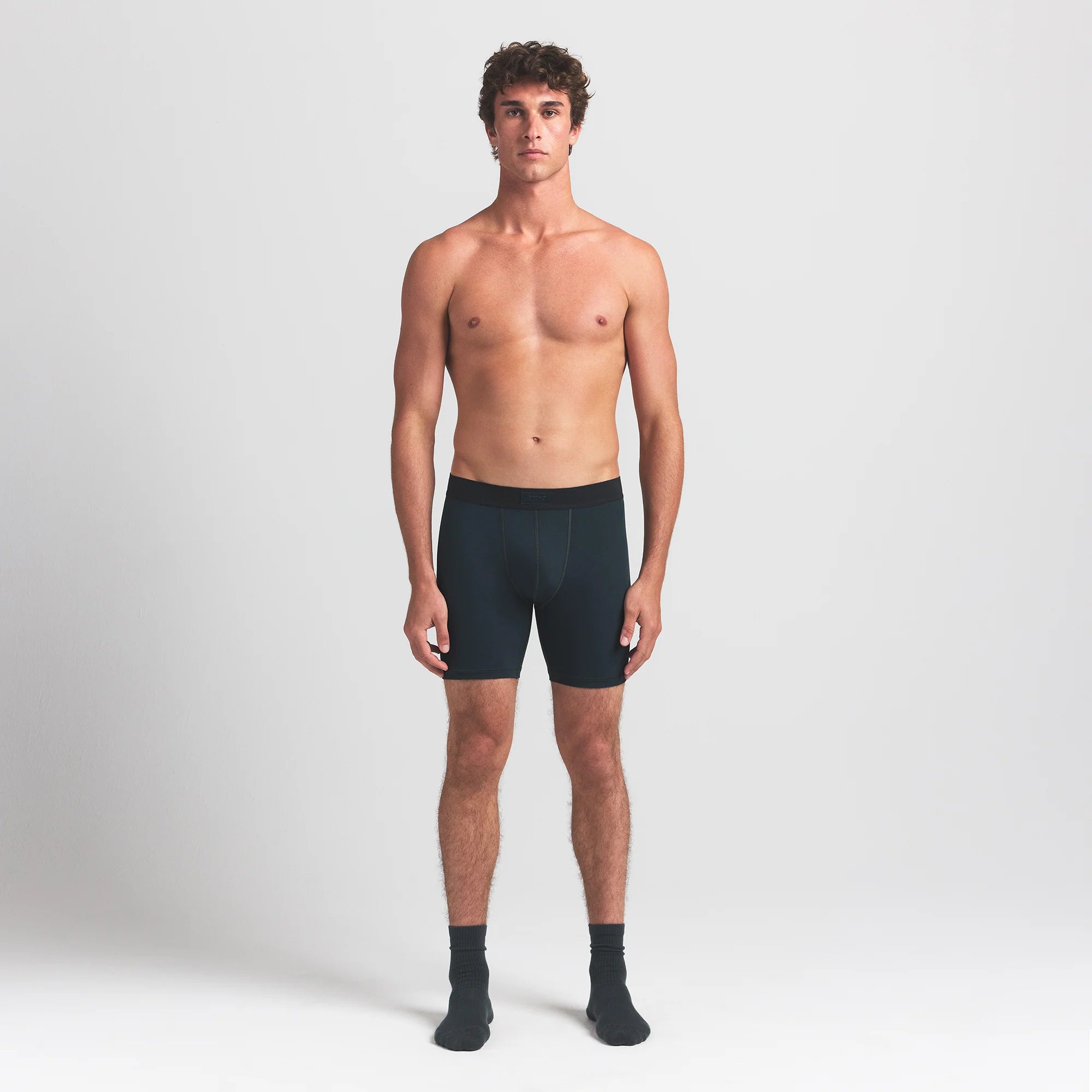 SKIMS COTTON MENS 5" BOXER BRIEF 3-PACK | VERDANT MULTI ON A MODEL FRONT VIEW @ | FOCUS: 0.0, 1.0, 0.9