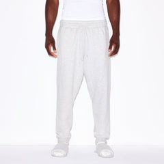 FLEECE LOUNGE MENS TAPERED JOGGER | LIGHT HEATHER GREY ON A MODEL SIDE VIEW @ | FOCUS: 0.0, 1.0, 0.9