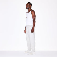 FLEECE LOUNGE MENS TAPERED JOGGER | LIGHT HEATHER GREY ON A MODEL FRONT VIEW @ | FOCUS: 0.0, 1.0, 0.9