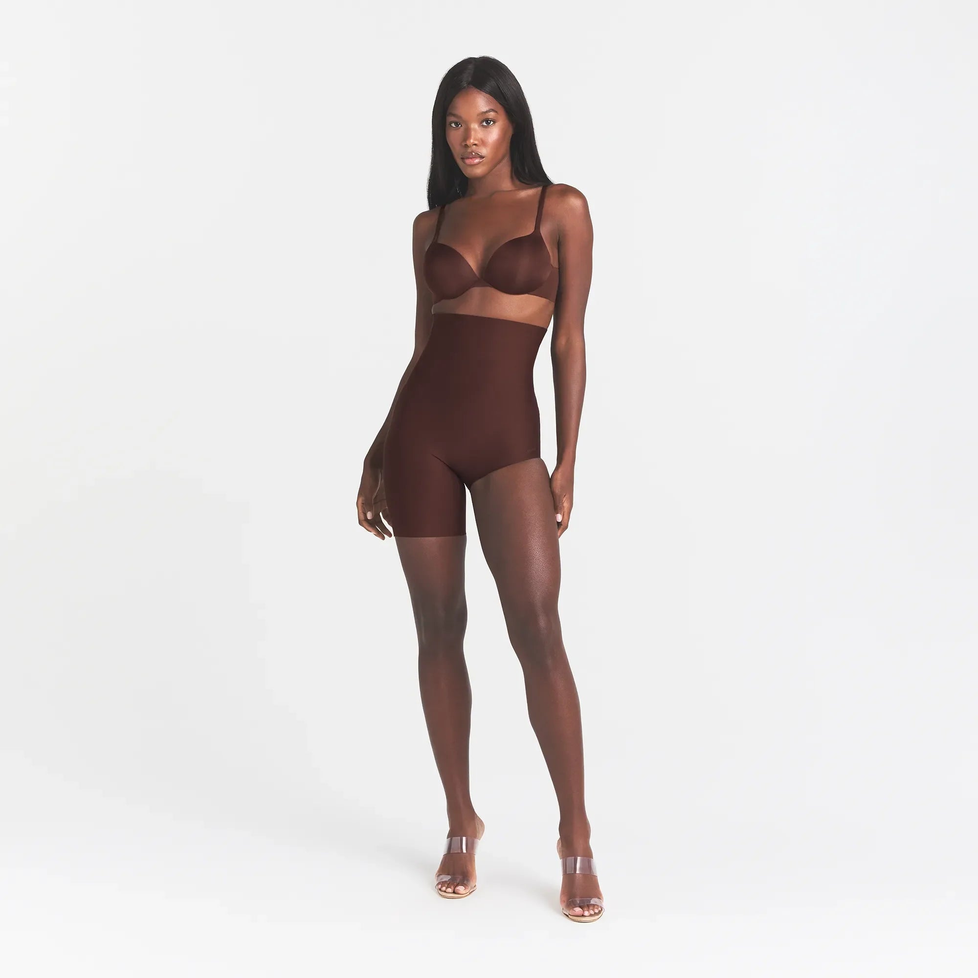 SKIMS BODY LEFT LEG SOLUTION SHORT | COCOA ON A MODEL FRONT VIEW @