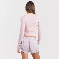 VOILE SLEEP BLOOMER SHORT | LIGHT LILAC ON A MODEL SIDE VIEW @ | FOCUS: 0.0, 1.0, 0.9