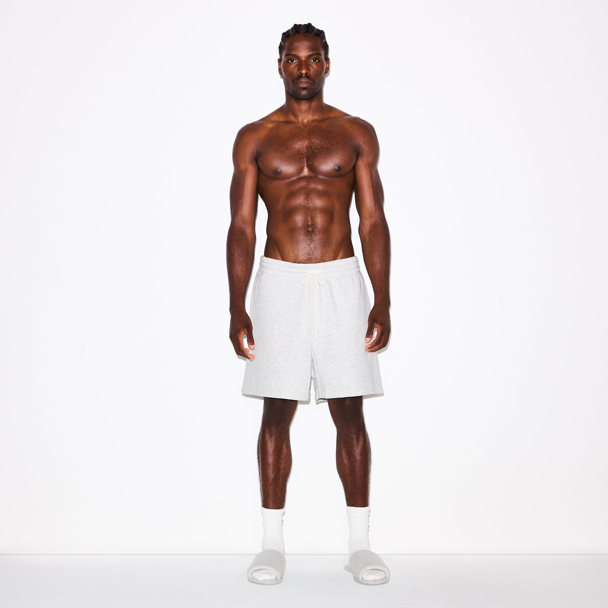 FLEECE LOUNGE MENS RELAXED SHORT | LIGHT HEATHER GREY ON A MODEL FRONT VIEW @ | FOCUS: 0.0, 1.0, 0.9