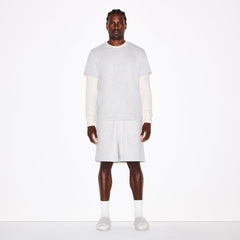 FLEECE LOUNGE MENS RELAXED SHORT | LIGHT HEATHER GREY ON A MODEL FRONT VIEW @ | FOCUS: 0.0, 1.0, 0.9