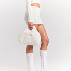 FAUX FUR MINI BAG | MARBLE ON A MODEL SIDE VIEW @ | FOCUS: 0.0, 1.0, 0.9