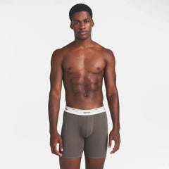 SKIMS COTTON RIB MENS 5" BOXER BRIEF | JUNGLE ON A MODEL FRONT VIEW @ | FOCUS: 0.0, 1.0, 0.9