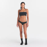 LIGHTWEIGHT COTTON STRAIGHT NECK BRALETTE | SOOT TONAL ON A MODEL FRONT VIEW