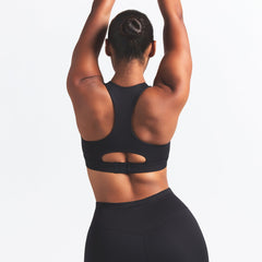 NikeSKIMS MATTE HIGH NECK BRA | OBSIDIAN ON A MODEL BACK VIEW