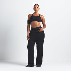 NikeSKIMS MATTE WIDE STRAP BRA | OBSIDIAN ON A MODEL FRONT VIEW @ | FOCUS: 0.9, 0.1, 0.7
