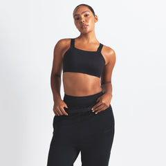 NikeSKIMS MATTE WIDE STRAP BRA | OBSIDIAN ON A MODEL FRONT VIEW