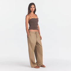 WOVEN COTTON OVERSIZED STRAIGHT LEG PANT | DESERT ON A MODEL FRONT VIEW @ | FOCUS: 0.0, 1.0, 0.9