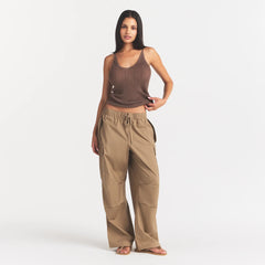 WOVEN COTTON OVERSIZED LOW RISE CARGO PANT | DESERT ON A MODEL FRONT VIEW @ | FOCUS: 0.0, 1.0, 0.9