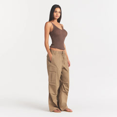 WOVEN COTTON OVERSIZED LOW RISE CARGO PANT | DESERT ON A MODEL FRONT VIEW @ | FOCUS: 0.0, 1.0, 0.9