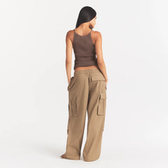 WOVEN COTTON OVERSIZED LOW RISE CARGO PANT | DESERT ON A MODEL FRONT VIEW @ | FOCUS: 0.0, 1.0, 0.9