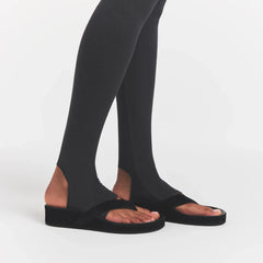 OUTDOOR STIRRUP LEGGING | WASHED ONYX ON A MODEL SIDEVIEW @ | FOCUS: 0.0, 1.0, 0.9