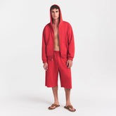 FLEECE LOUNGE MENS RELAXED LONG SHORT | WASHED RED ON A MODEL FRONT VIEW @ | FOCUS: 0.0, 1.0, 0.9