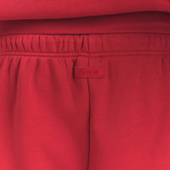 FLEECE LOUNGE MENS RELAXED LONG SHORT | WASHED RED ON A MODEL SIDE VIEW @ | FOCUS: 0.0, 1.0, 0.9