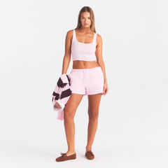 COTTON FLEECE CLASSIC SHORT | CHERRY BLOSSOM ON A MODEL FRONT VIEW @ | FOCUS: 0.0, 1.0, 0.9