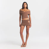 COTTON JERSEY CUT OUT MINI SKIRT | JASPER ON A MODEL FRONT VIEW @ | FOCUS: 0.0, 1.0, 0.9
