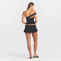 COTTON JERSEY FOLDOVER MINI SKORT | SOOT ON A MODEL BACK VIEW @ | FOCUS: 0.0, 1.0, 0.9