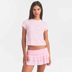 SHEER KNIT RUFFLE MINI SKIRT | PEONY ON A MODEL FRONT VIEW @ | FOCUS: 0.0, 1.0, 0.9