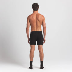 SKIMS STRETCH MENS KNIT BOXER | OBSIDIAN ON A MODEL BACK VIEW @ | FOCUS: 0.0, 1.0, 0.9