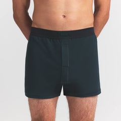 SKIMS COTTON MENS KNIT BOXER | VERDANT ON A MODEL FRONT VIEW @ | FOCUS: 0.0, 1.0, 0.9