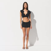 COTTON COVER-UPS SHORT | ONYX ON A MODEL FRONT VIEW @ | FOCUS: 0.0, 1.0, 0.9