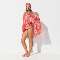SHEER COVER-UPS SHORT KAFTAN | CARMINE ZEBRA PRINT ON A MODEL SIDE VIEW @ | FOCUS: 0.0, 1.0, 0.9