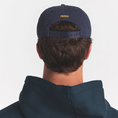 SKIMS ACCESSORIES MENS BASEBALL CAP | NAVY ON A MODEL BACK VIEW @ | FOCUS: 0.0, 1.0, 0.9