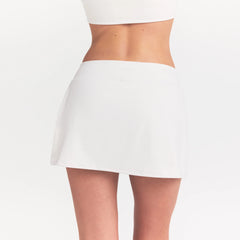 NikeSKIMS MATTE SKORT | IVORY ON A MODEL