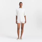 NikeSKIMS AIRY OVERSIZED TEE | IVORY ON A MODEL