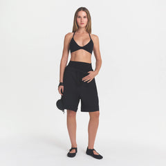 NikeSKIMS STUDIO STRETCH T-BACK TRIANGLE BRA | OBSIDIANON A MODEL FRONT