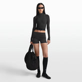 NikeSKIMS ACCESSORIES WAISTPACK | OBSIDIAN ON A MODEL FRONT VIEW @ | FOCUS: 0.0, 1.0, 0.9