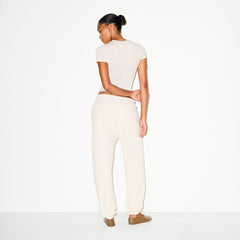 COTTON FLEECE CLASSIC JOGGER | OATMEAL HEATHER ON A MODEL BACK VIEW @ | FOCUS: 0.0, 1.0, 0.9