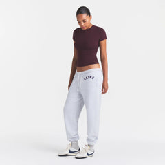 COTTON FLEECE CLASSIC JOGGER | LIGHT HEATHER GREY ARCHED SKIMS PLAID ON A MODEL | FOCUS: 0.0, 1.0, 0.9