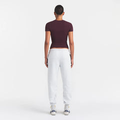 COTTON FLEECE CLASSIC JOGGER | LIGHT HEATHER GREY ARCHED SKIMS PLAID ON A MODEL | FOCUS: 0.0, 1.0, 0.9