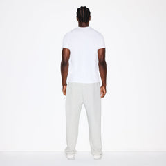 FLEECE LOUNGE MENS RELAXED JOGGER | LIGHT HEATHER GREY ON A MODEL FRONT VIEW @ | FOCUS: 0.0, 1.0, 0.9