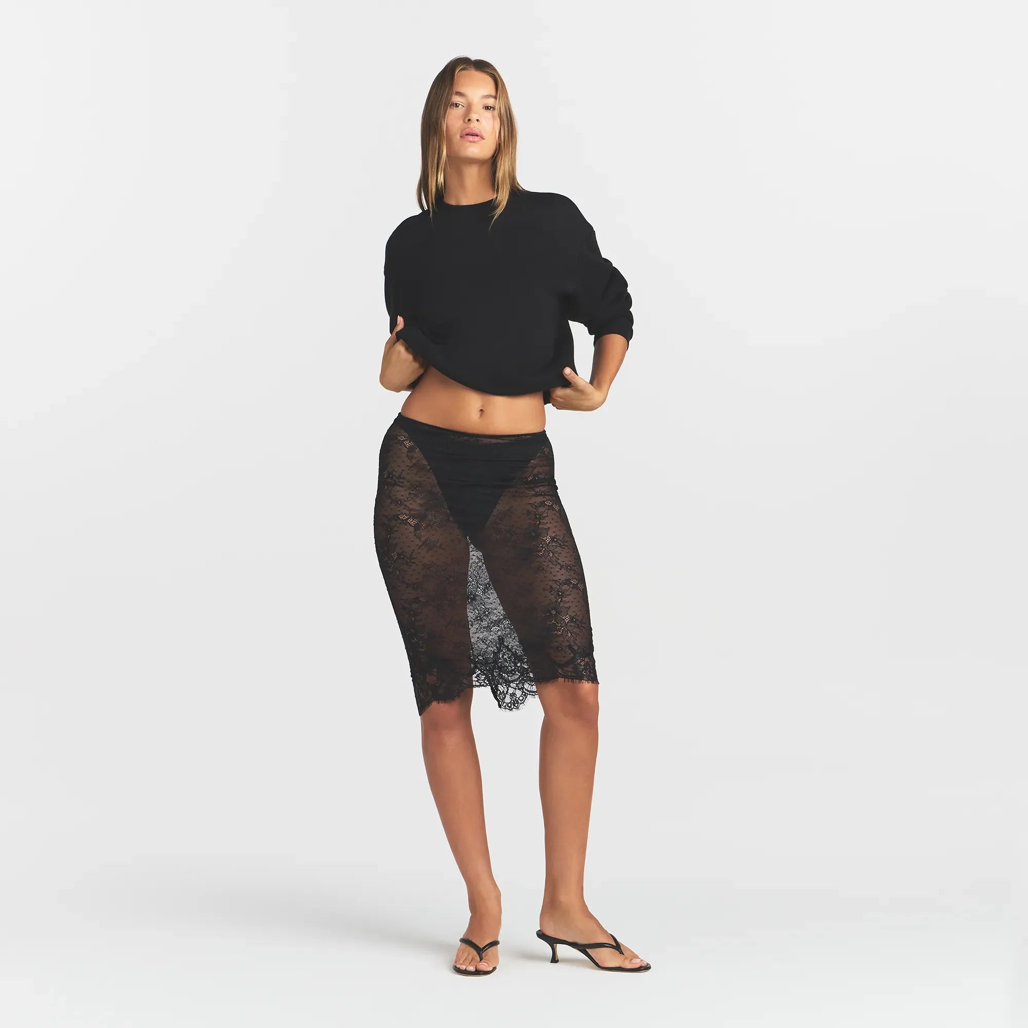 ULTRA FINE LACE MIDI SKIRT | OBSIDIAN ON A MODEL FRONT VIEW @ | FOCUS: 0.0, 1.0, 0.9
