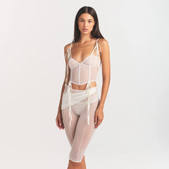 ULTRA FINE MESH DRAPED CAPRI | IVORY ON A MODEL SIDE VIEW @ | FOCUS: 0.0, 1.0, 0.9