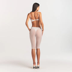 ULTRA FINE MESH DRAPED CAPRI | IVORY ON A MODEL FRONT VIEW @ | FOCUS: 0.0, 1.0, 0.9