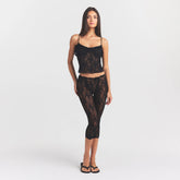 STRETCH LACE RUFFLE CAMI | SOOT ON A MODEL FRONT VIEW @ | FOCUS: 0.0, 1.0, 0.9