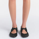 NikeSKIMS FOOTWEAR RIFT SATIN | BLACK ON A MODEL SIDE VIEW| FOCUS: 0.0, 1.0, 0.9