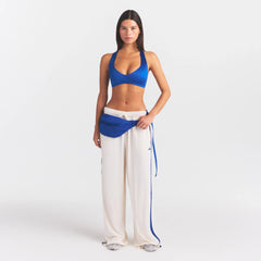 NikeSKIMS ACCESSORIES FANNY PACK | COBALT ON A MODEL FRONT VIEW @ | FOCUS: 0.0, 1.0, 0.9
