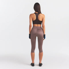 NikeSKIMS SATIN SHINE CAPRI 17" LEGGING | RESIN ON A MODEL FRONT VIEW
