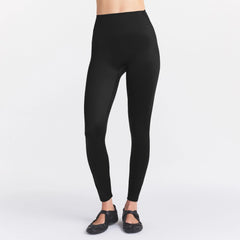 NikeSKIMS SATIN SHINE BONDED WAIST 26" LEGGING | OBSIDIAN ON A MODEL SIDE VIEW