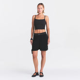 NikeSKIMS STRETCH KNIT DOLPHIN SHORT | OBSIDIAN ON A MODEL FRONT VIEW @ | FOCUS: 0.0, 1.0, 0.9