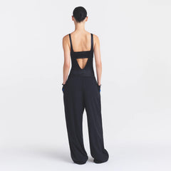 NikeSKIMS STRETCH NYLON OVERSIZED PANT | OBSIDIAN ON A MODEL FRONT VIEW